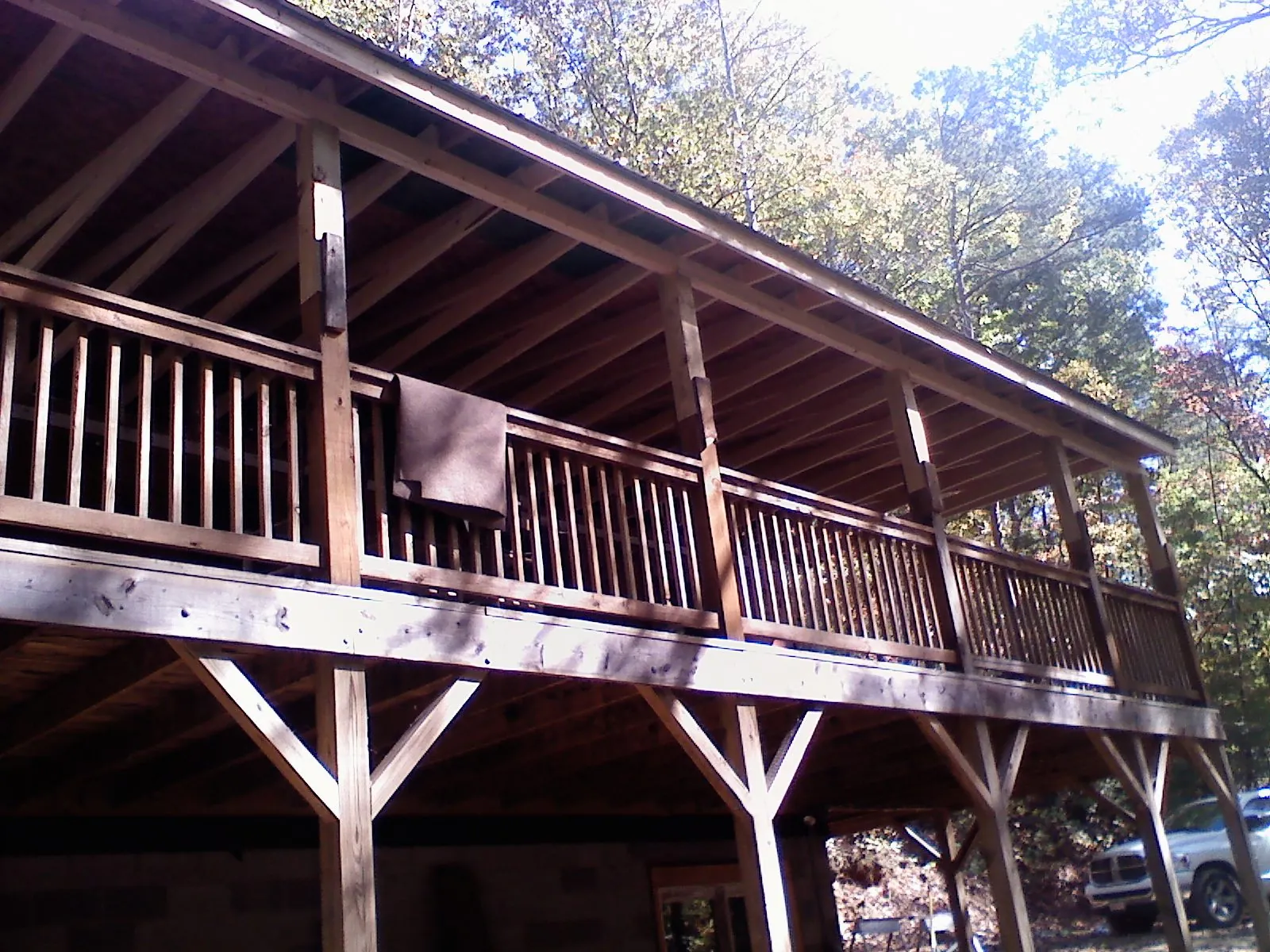 Timber framing under a new elevated porch and deck — Roof Leak Repair in North Lewisburg by Roofing Brothers